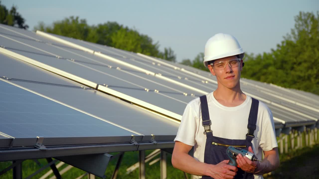 Solar panel technician working with solar panels. The green energy concept
