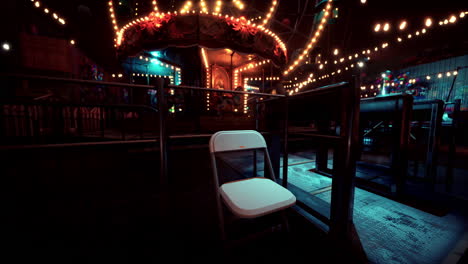 nighttime amusement park with a vibrant carousel and bright lights