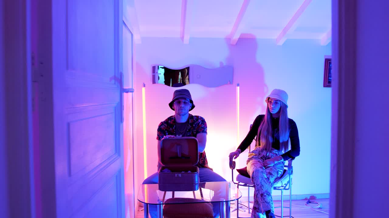 revealing shot of customers queueing up to buy drugs from a drug dealer