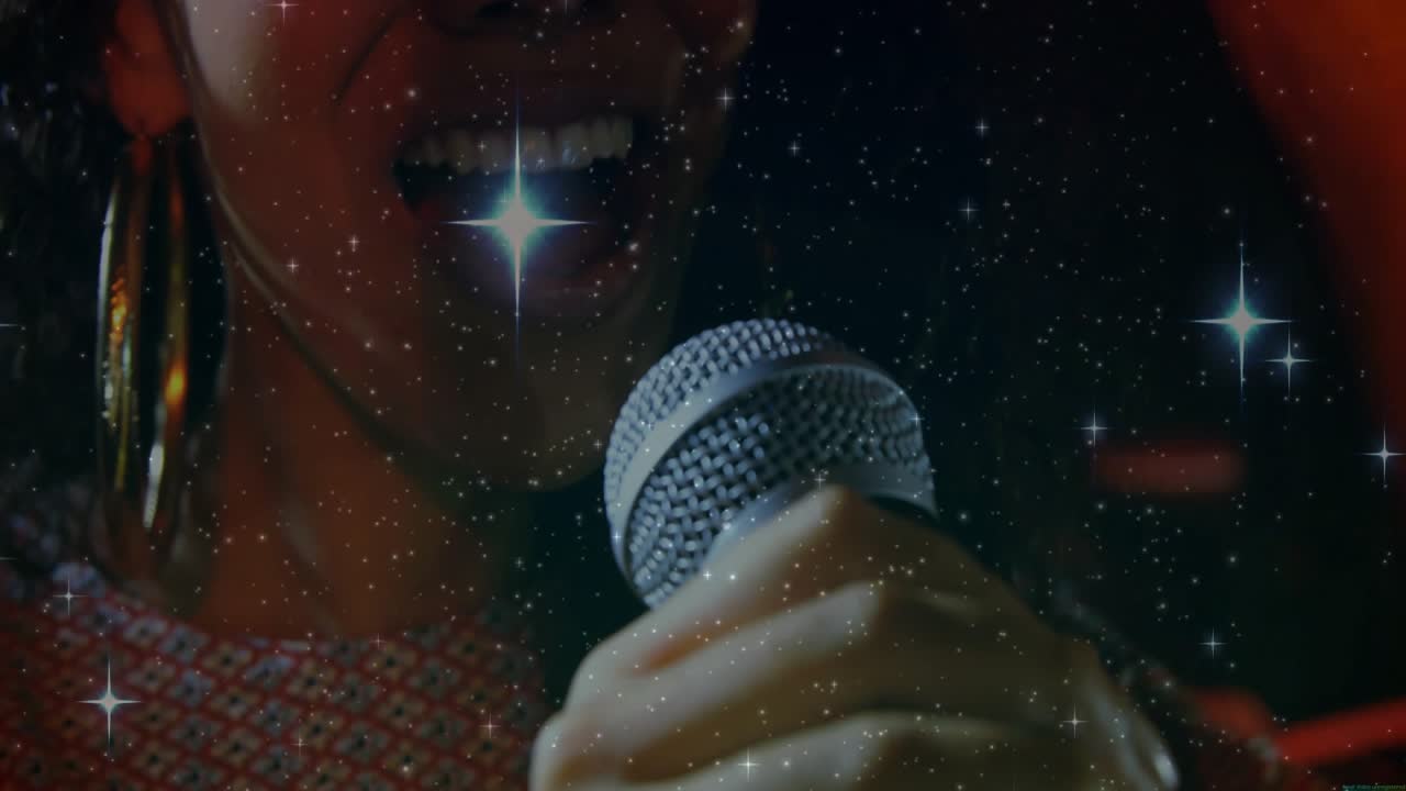 Woman singer bringing mic close, singing, expressing lyrics in music, with sparkle overlay on frame
