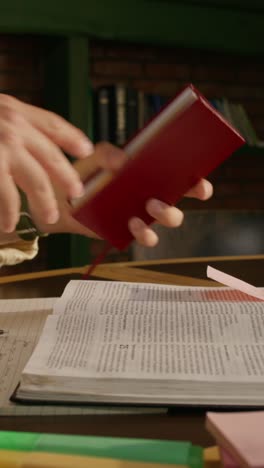 close-up of someone studying a book