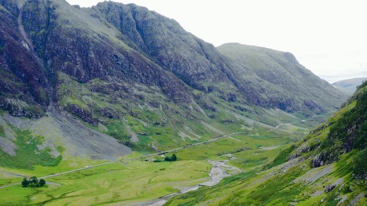 Aerial Drone Shot of Road Through the Glen Coe Hills 03
