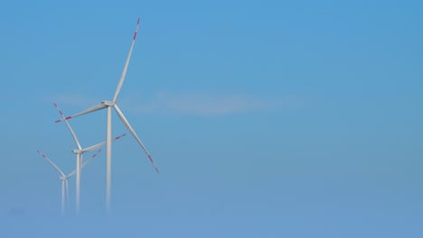 windmills produce energy at eco-friendly offshore station