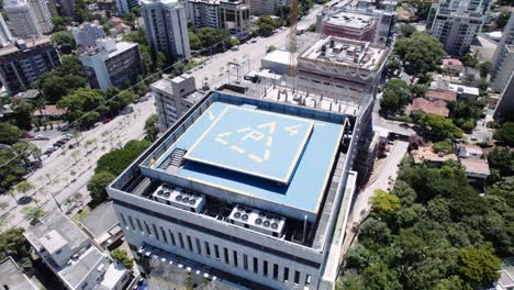 helicopter landing pad on top of rooftop of building, helipad.