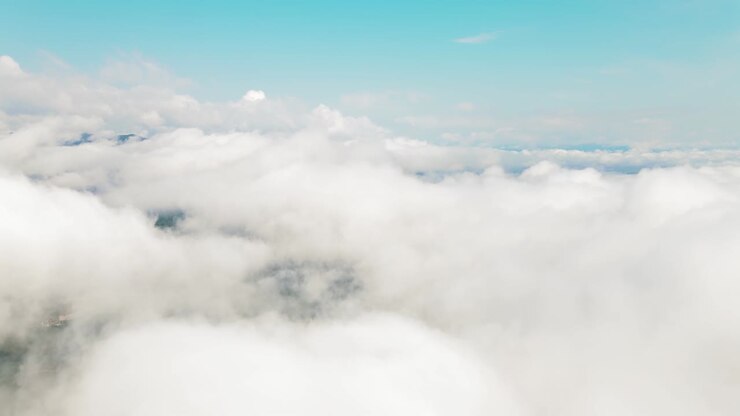 Flying in the clouds flying in the clouds. The clouds are moving on camera. Flying through the cloud