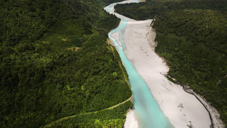 A-view-from-above-on-a-river-flowing-down-the-valley-from-Mount-Cook