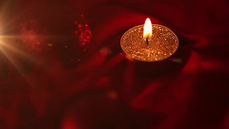 animation of christmas red bauble decoration and candle