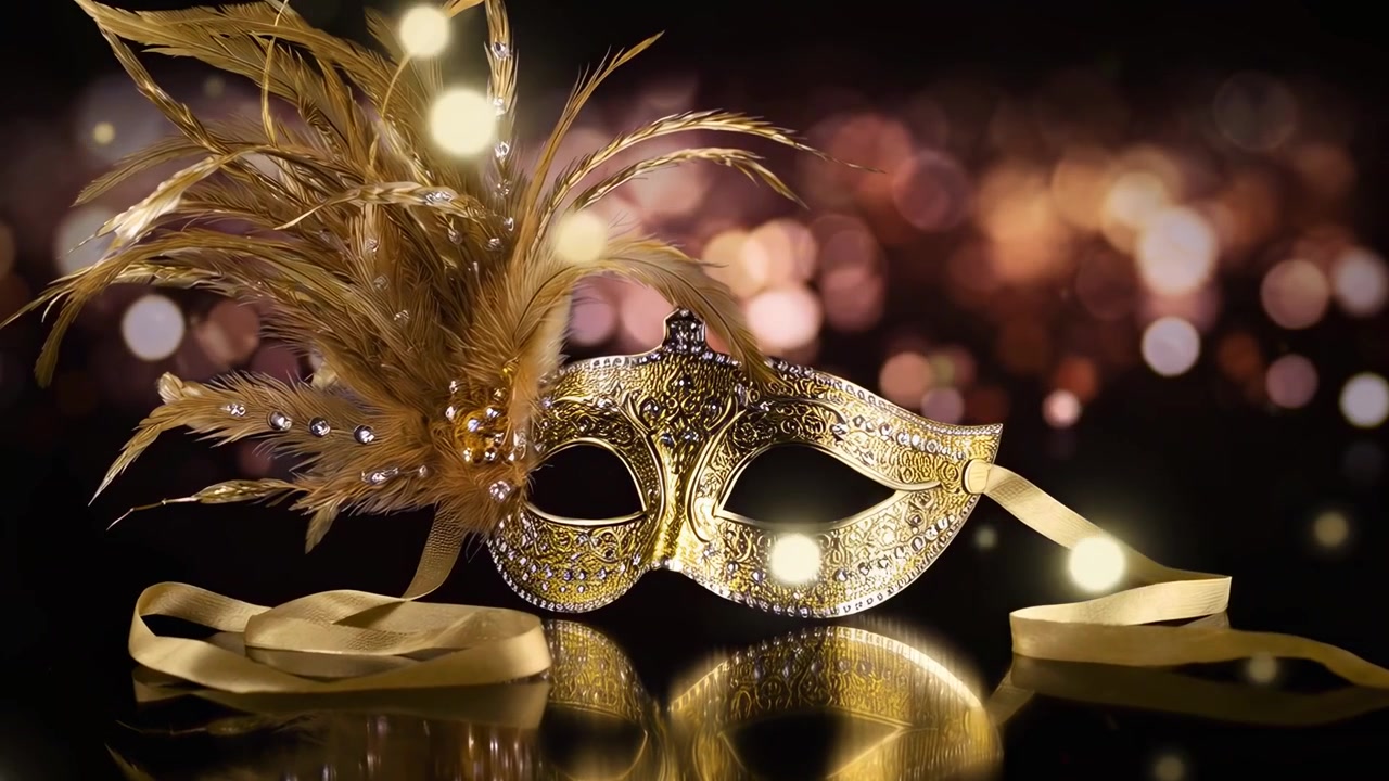 Elegante maschera veneziana dorata con piume e gioielli scintillanti