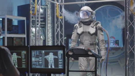 astronaut spacesuit testing in a simulation lab