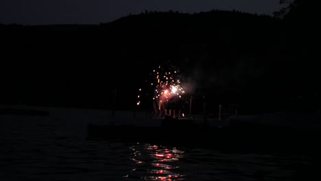 fireworks off of a dock