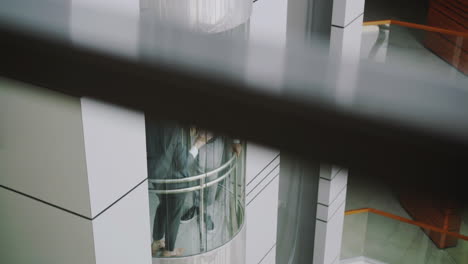 business people in an elevator