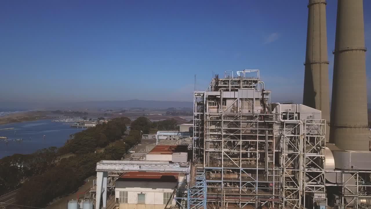Moss Landing - California, USA. Cinematic aerial right pan across energy facility. Filmed on DJI Mavic Pro