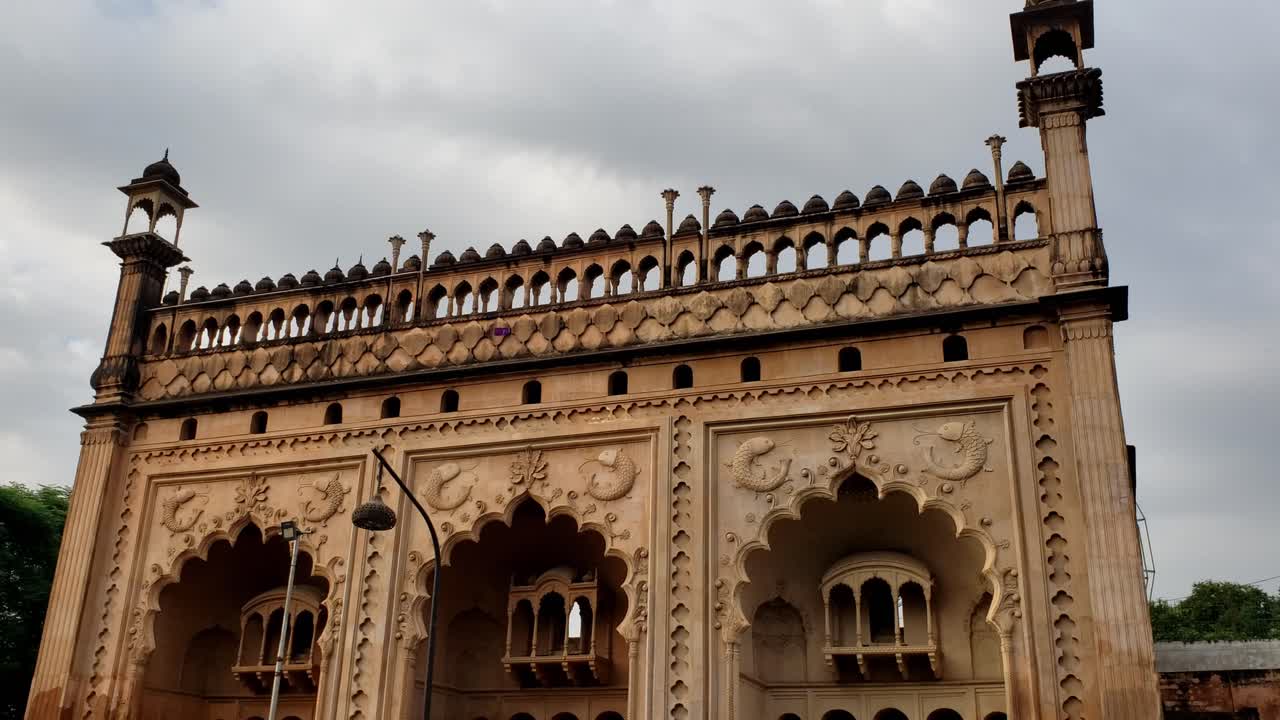 The main entrance gate of the Bada Imambara complex on the city road with Islamic architecture built by Nawab Asaf-ud-daula