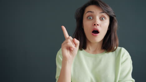 surprised woman pointing