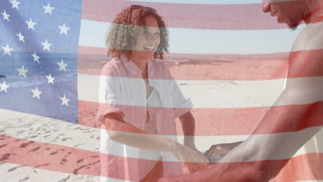 animation of flag of usa over happy diverse friends recycling on beach in summer