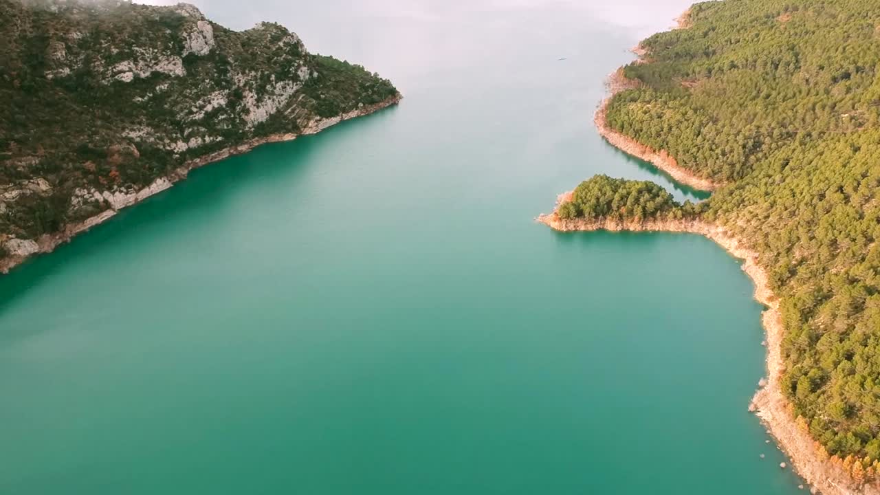 scenery background of Barcelona mountains with the water flowing along them