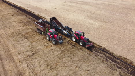 Arial:-Danish-Carrots-harvest-in-tractors