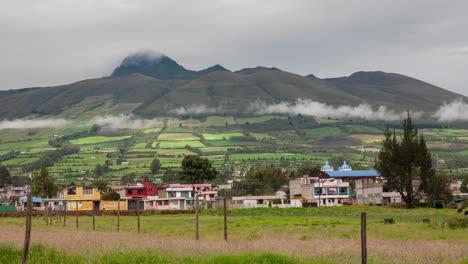 time lapse of the parish of aloasi with the background of the el corazon or guallancatzo volcano