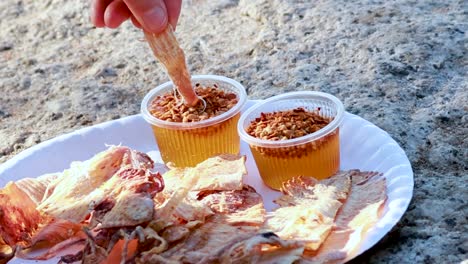 street food experience: fried squid with dipping sauce