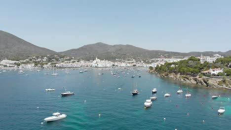 beautiful rocky coast with beach and boats