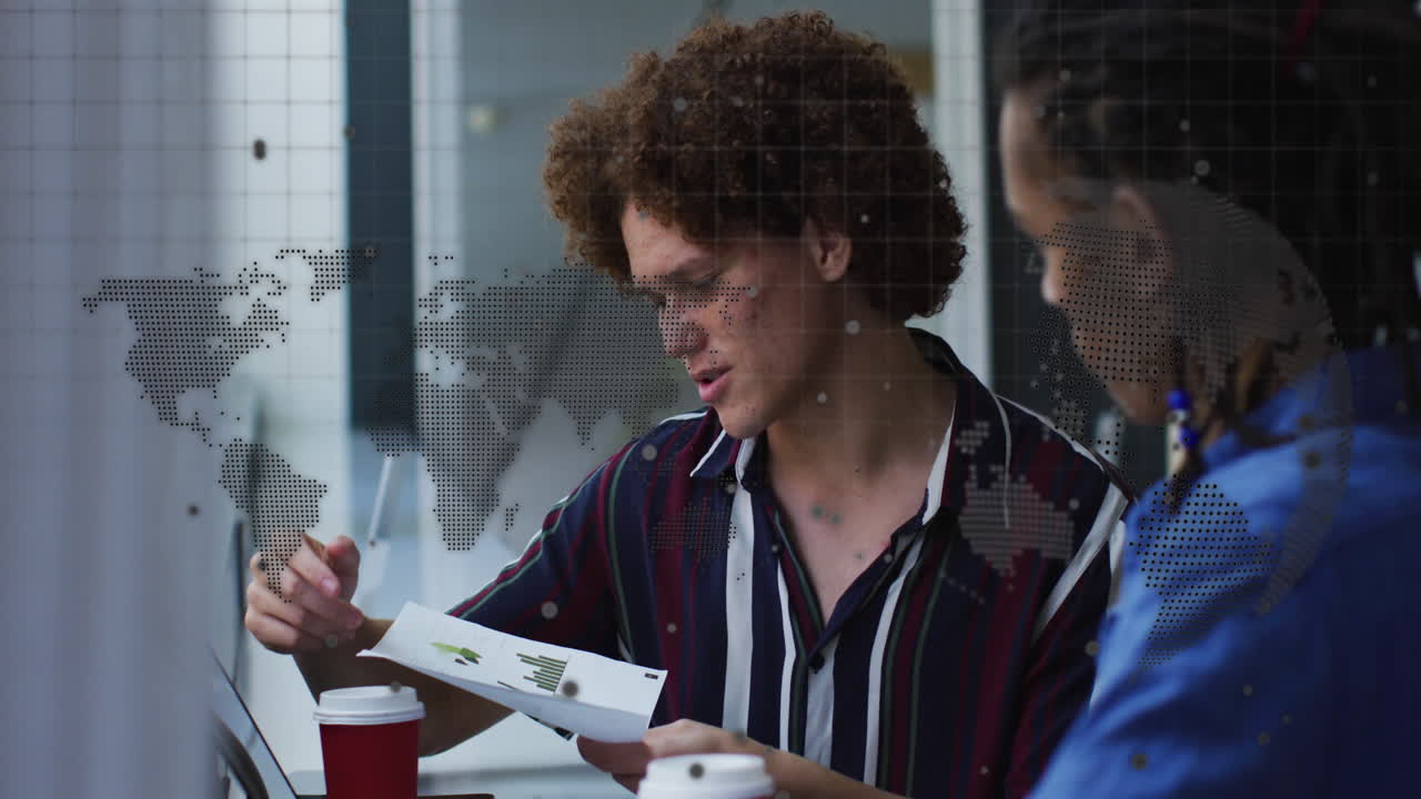 Animation of data processing and world map over diverse business people in office