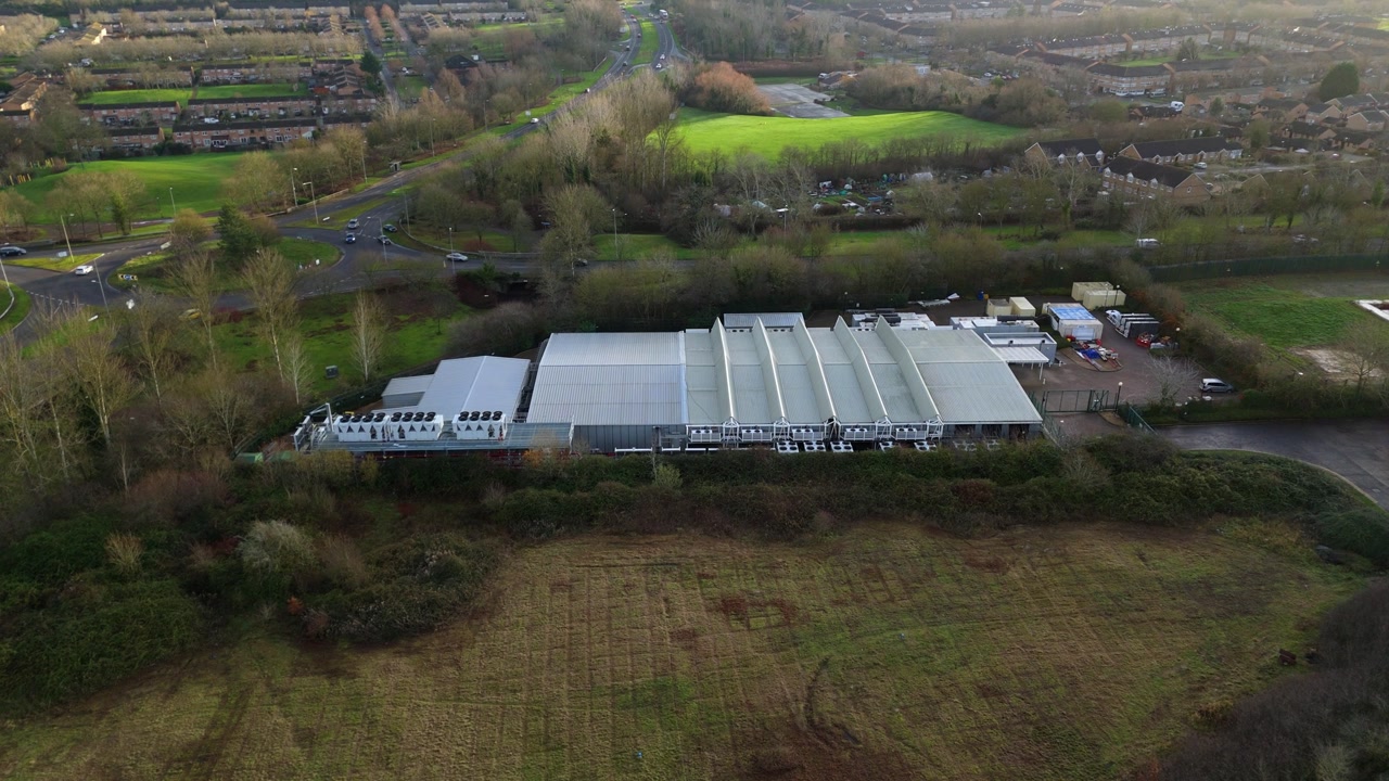 Drone view of specialized cooling infrastructure for a high-density AI data center in Buckinghamshire.