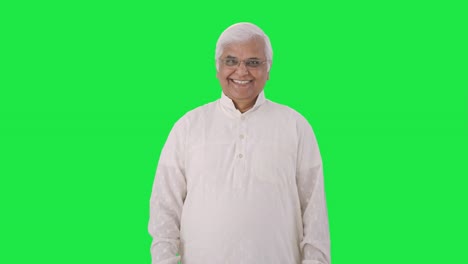 Happy-Indian-old-man-smiling-at-the-camera-Green-screen