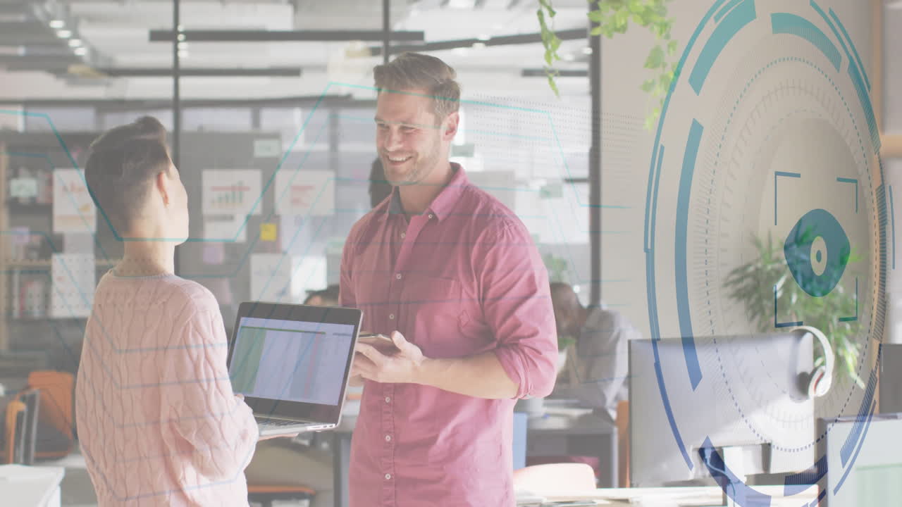 Professionals presenting spreadsheet data in open-plan office, displaying circular graphic overlay