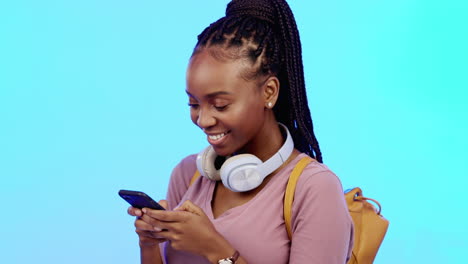 Phone,-happy-and-black-woman-in-a-studio