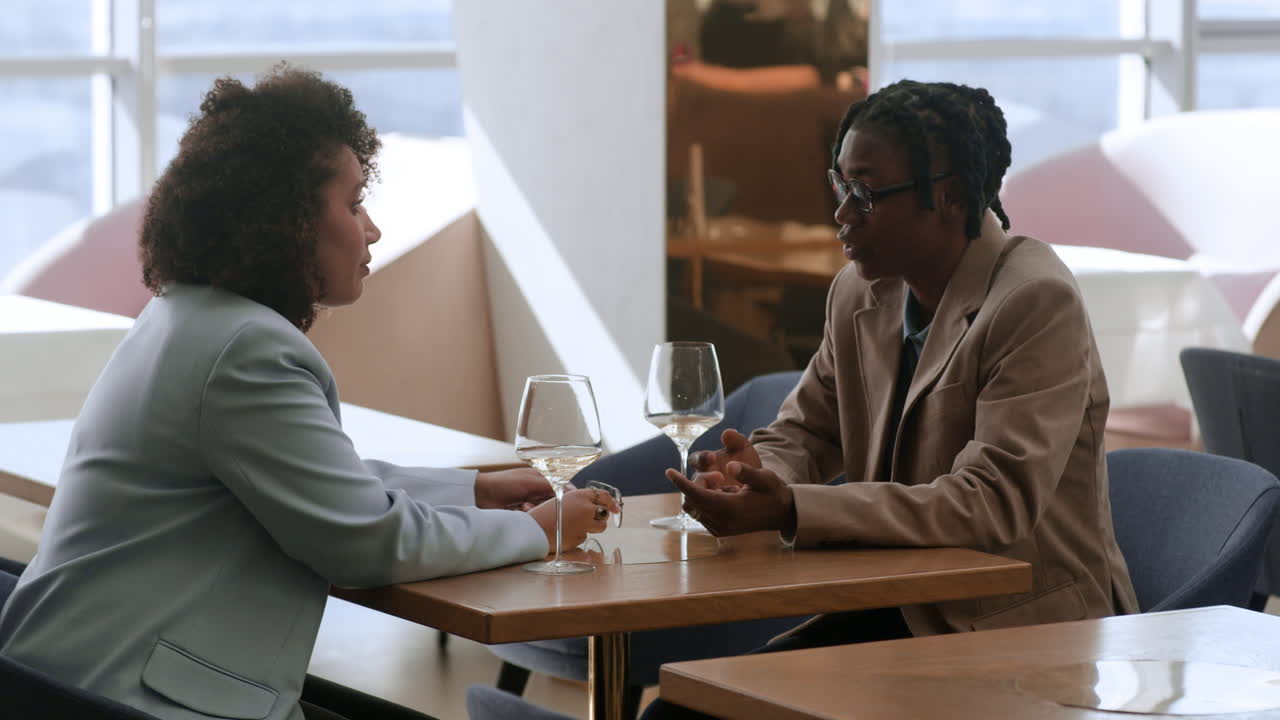 Business Meeting at a Modern Cafe