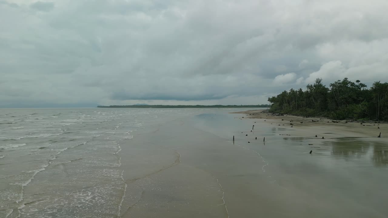 Aerial Drone View Of Sempadi Beach,During Raining Season,Dark Cloud Monsoon Tropical Asian,Sarawak,Borneo.