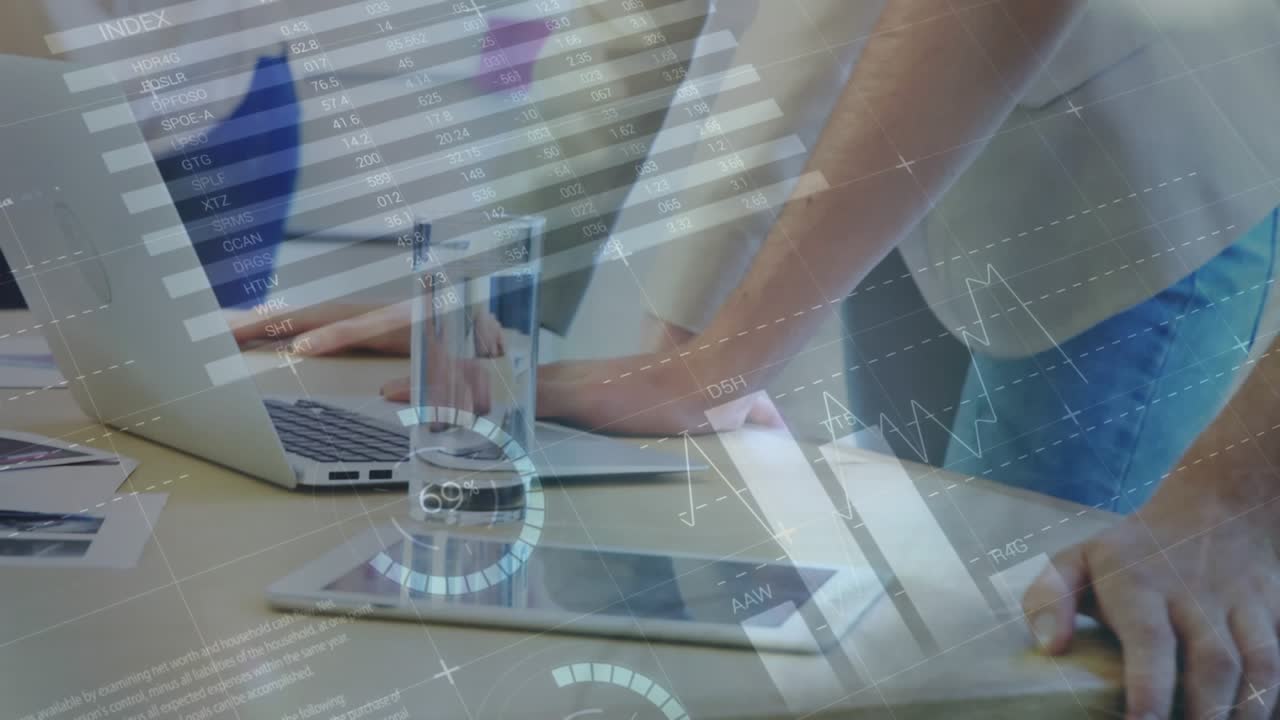 Animation of statistical data processing against caucasian man and woman discussing at office