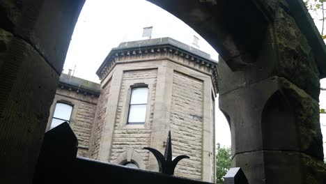 Bidston-hill-historic-astronomy-observatory-tower-though-ornate-iron-entrance-gates-left-dolly