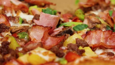 assorted pizzas with diverse toppings and meats