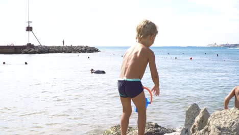 child playing on the beach