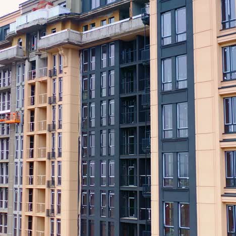 construction of modern tower building. exterior of a new architecture in the city. building of high-rise house.