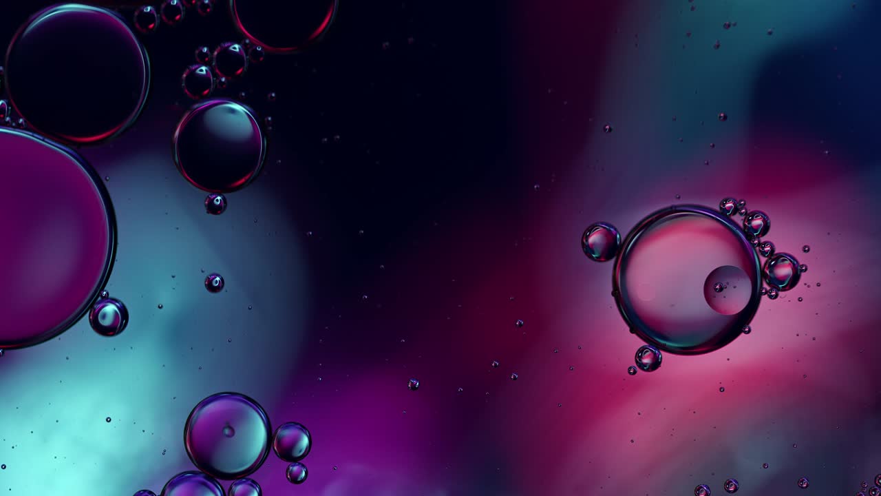 Abstract Colorful Food Oil Drops Bubbles and spheres Flowing