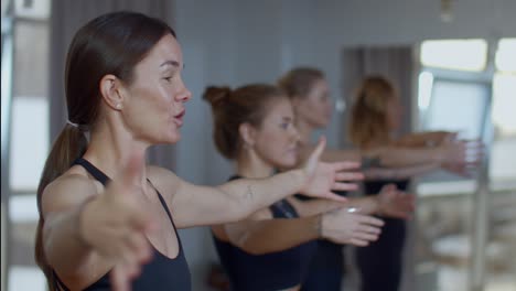 women practicing yoga or pilates