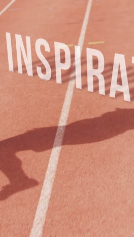 athletic man running with the word inspiration on the floor