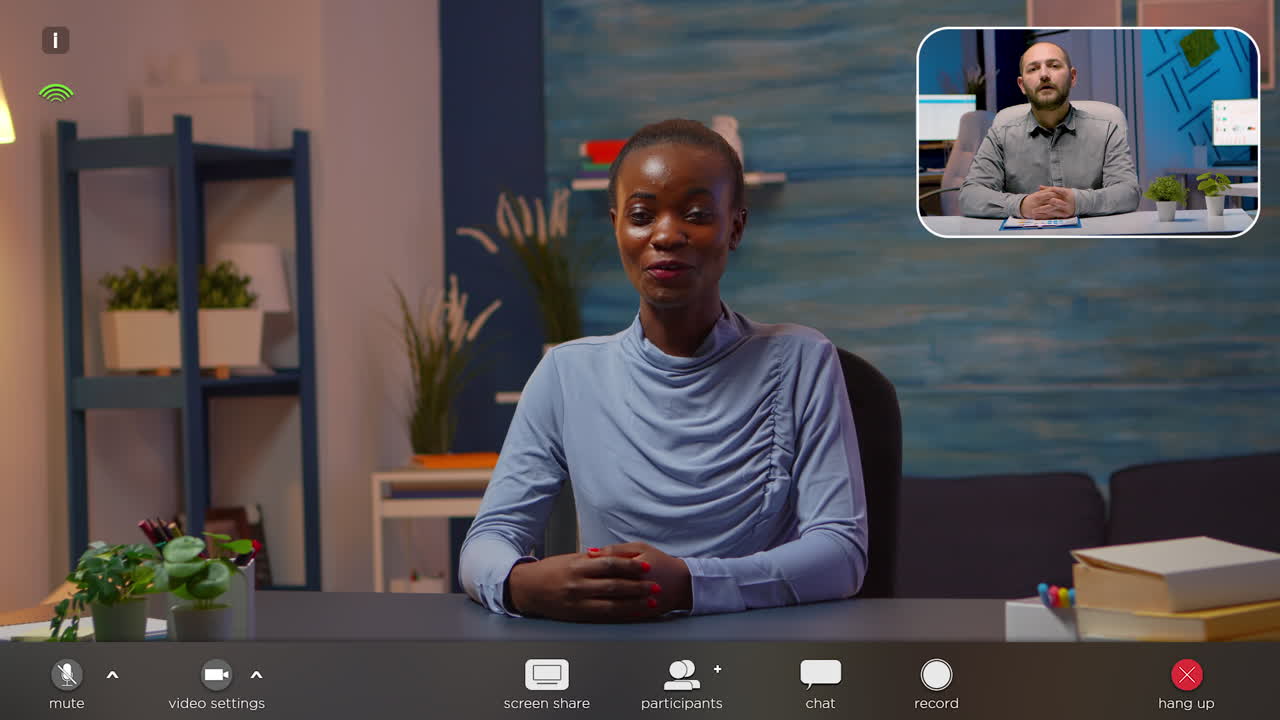 Black business woman talking in front of camera having video call