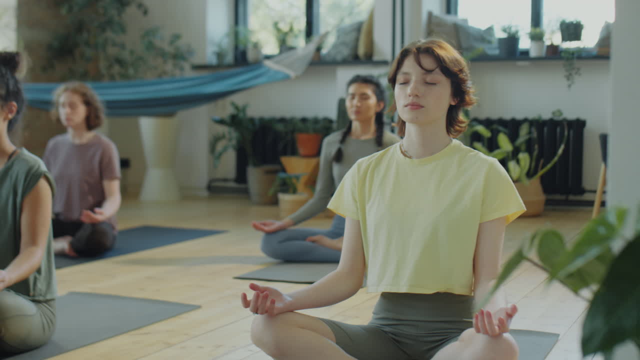 Girl Meditating on Yoga Class