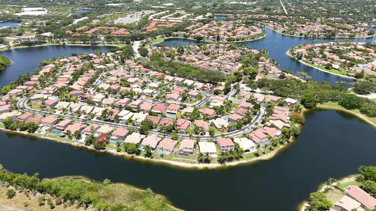 Drone Shot of Typical Modern Residential Community in Florida USA, Expensive Homes on Island and Lakes