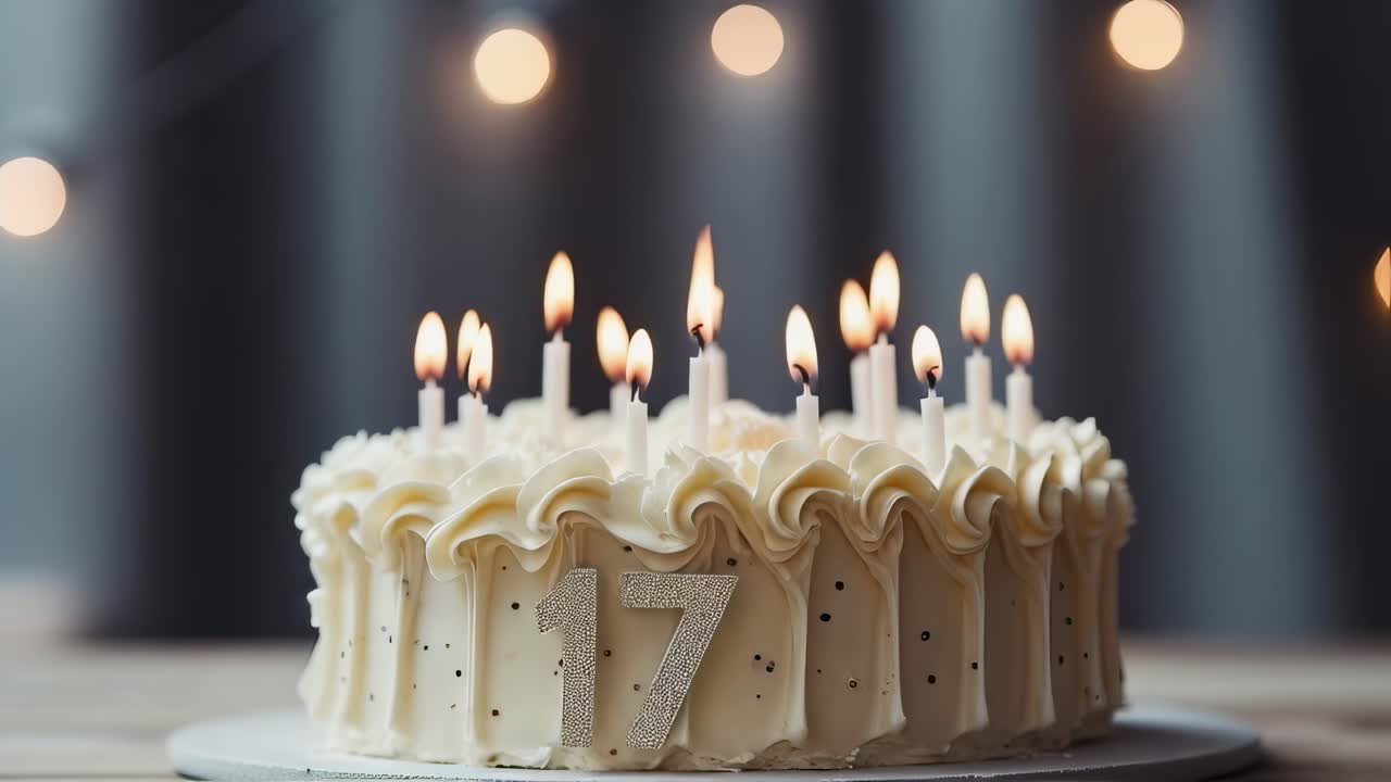 Delicious seventeenth birthday cake adorned with lit candles and a beautiful bokeh effect, waiting to be cut and enjoyed at a joyful birthday party celebration