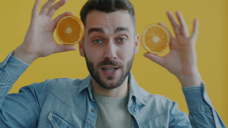 man with orange slices on face