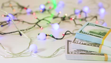 dollars of different denominations, bundles of money with bokeh back.