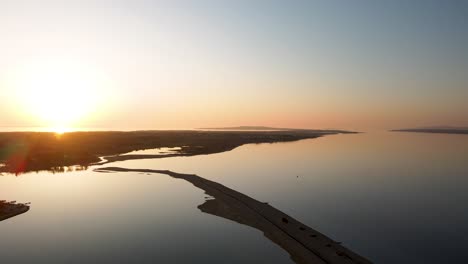 drone flight over the sea plaza ninska laguna in croatia city nin at sun set