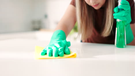 spray bottle, person hands and cleaning table