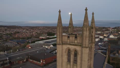 Aerial-view-of-St-Jame's-church-in-the-midlands,-Christian,-Roman-catholic-religious-orthodox-building-in-a-mainly-muslim-area-of-Stoke-on-Trent-in-Staffordshire,-City-of-Culture