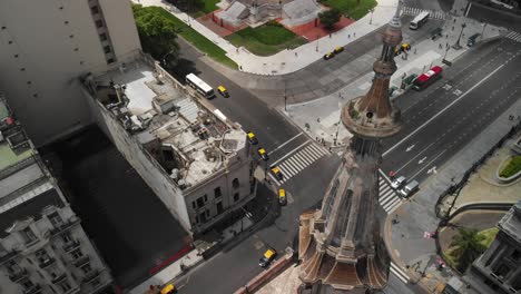 aerial shot during the day of the dome of a building and the park