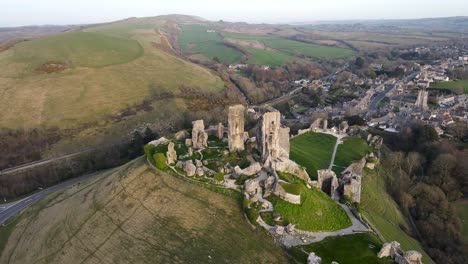 amazing view of corfe castle perched on hill during golden hour